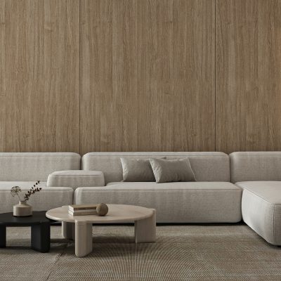 A tastefully designed minimalist living space highlighting an elegant beige modular sofa set against warm wood paneling